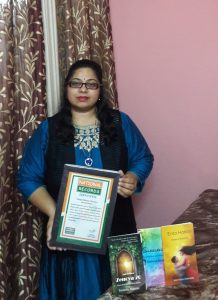 Reetwika with National Record certificate and her books